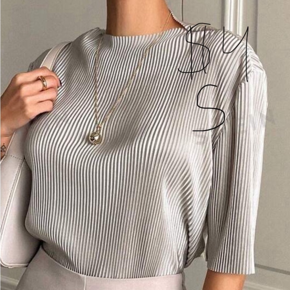 Ruffle shirt.
